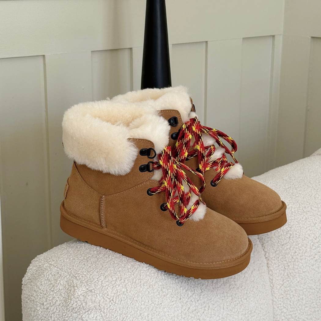 Side angled view of AUSTRALIAN SHEPHERD UGG Boots Sheepskin Wool Collar Lace Up Trego AS 3110 in Chestnut highlighting the wool collar, premium suede, and lace-up design.