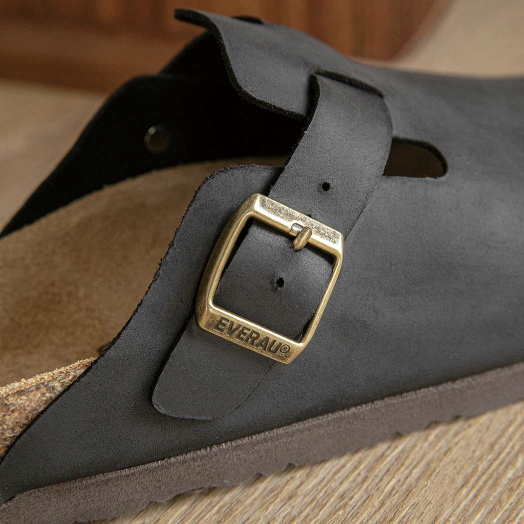 Close-up of EVERAU Brooklyn Adjustable Buckled Slides Women Leather Slip-On Flat Sandals EA 7058 in Black highlighting the adjustable buckle and leather upper.