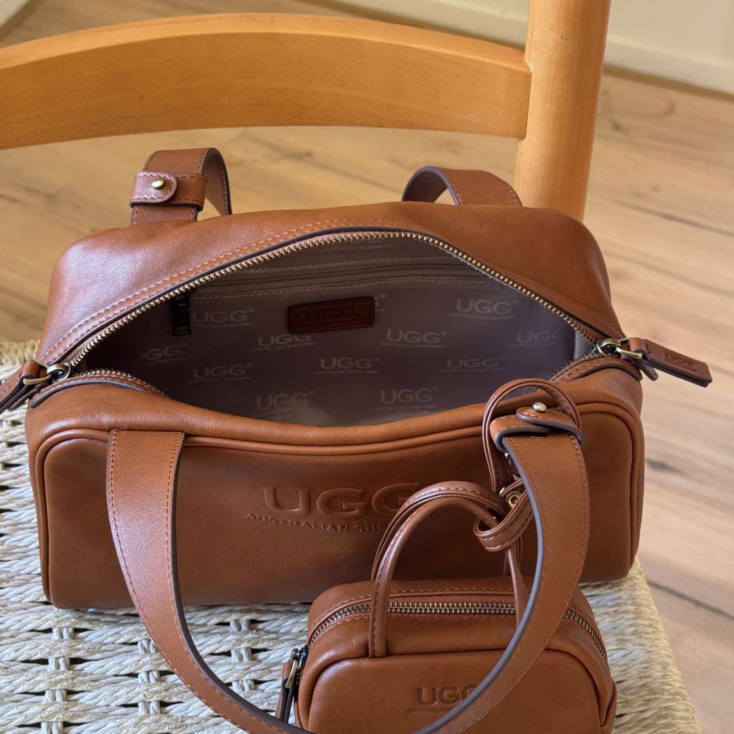 Interior view of AUSTRALIAN SHEPHERD® Dunelight Leather Barrel Crossbody Bag ASA 065 with spacious zip compartment and premium lining.