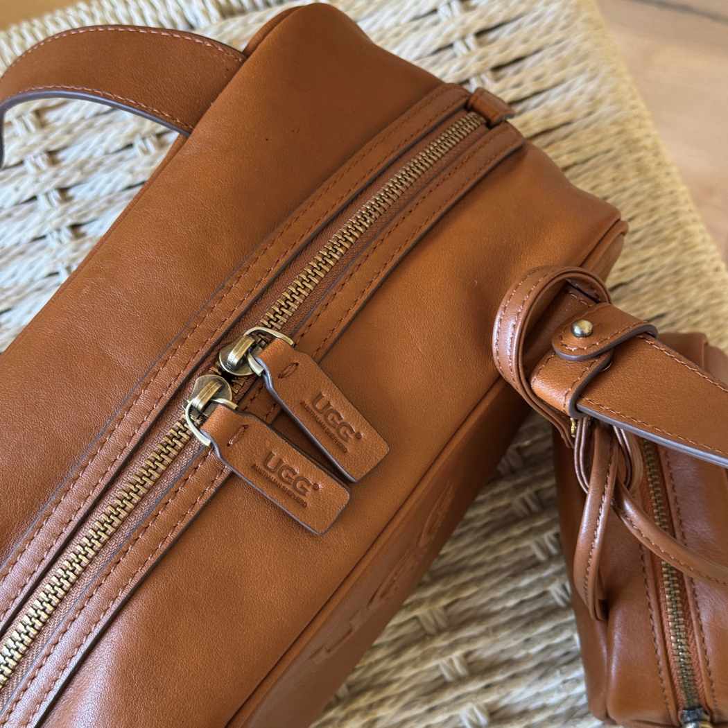 Close-up of AUSTRALIAN SHEPHERD® Dunelight Leather Barrel Crossbody Bag ASA 065 featuring premium leather, smooth zip closure, and fine stitching.