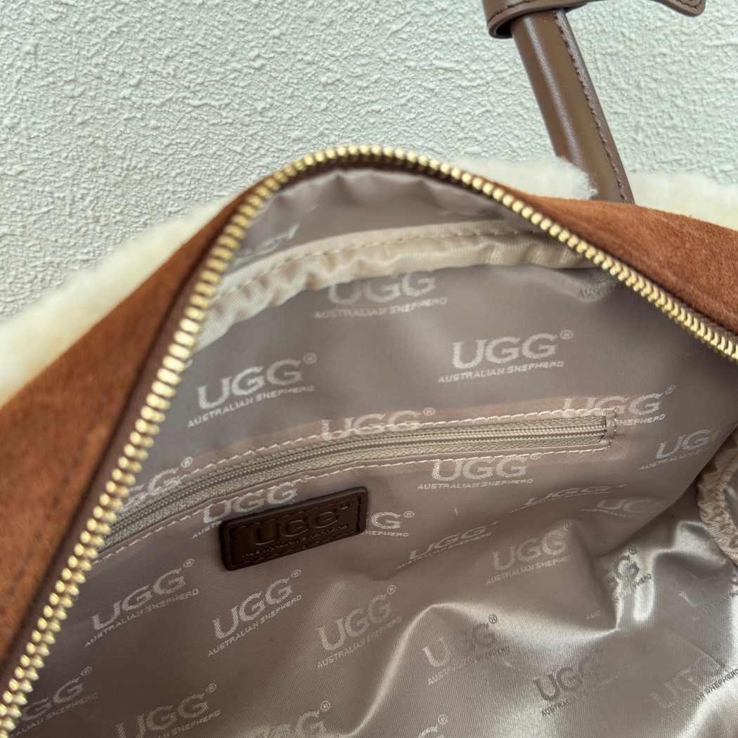 Interior view of AUSTRALIAN SHEPHERD® Snowbelle Wool & Leather Barrel Handbag ASA 064 featuring a spacious lined compartment with zip closure.