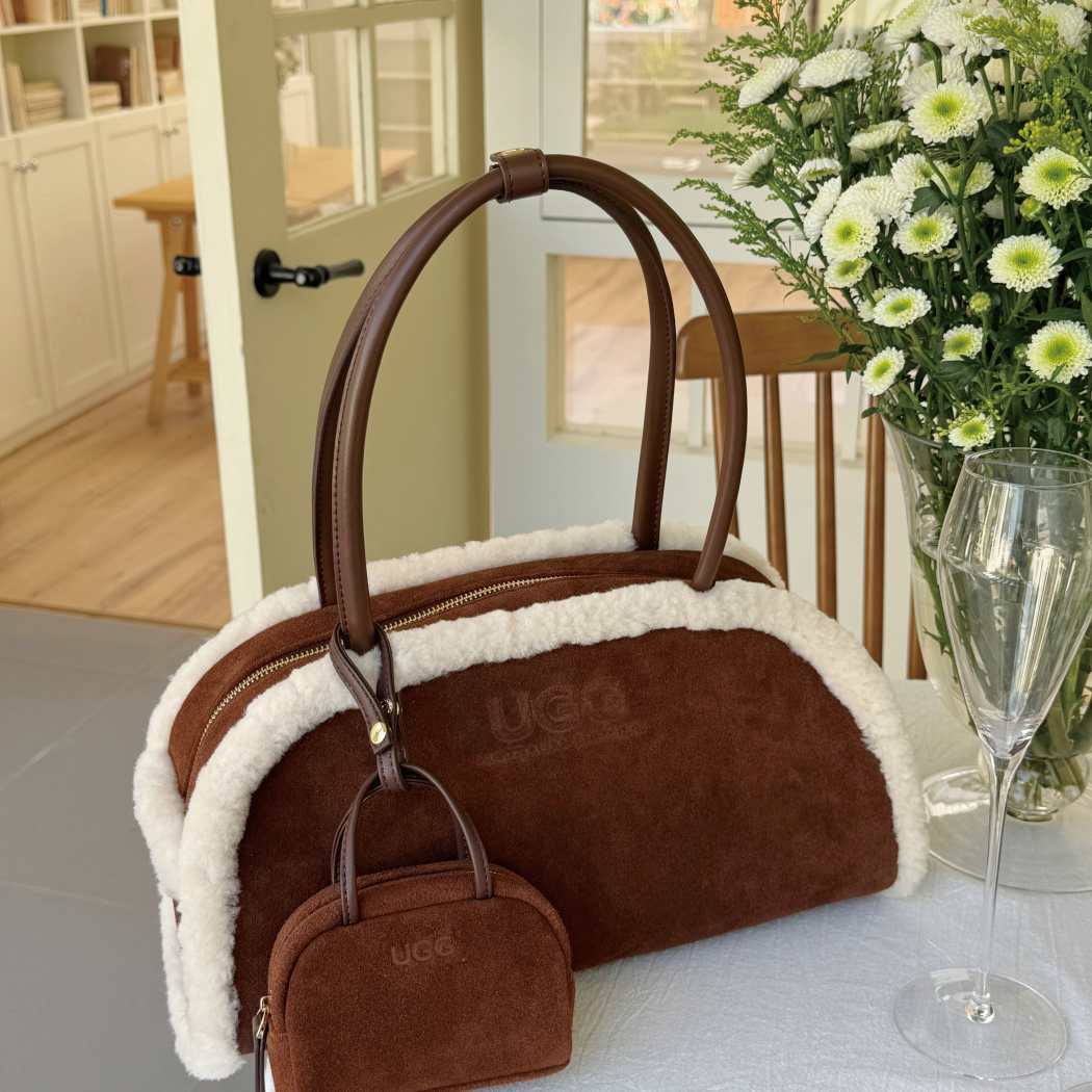 Lifestyle view of AUSTRALIAN SHEPHERD® Snowbelle Wool & Leather Barrel Handbag ASA 064 in Chocolate for everyday fashion and casual wear.