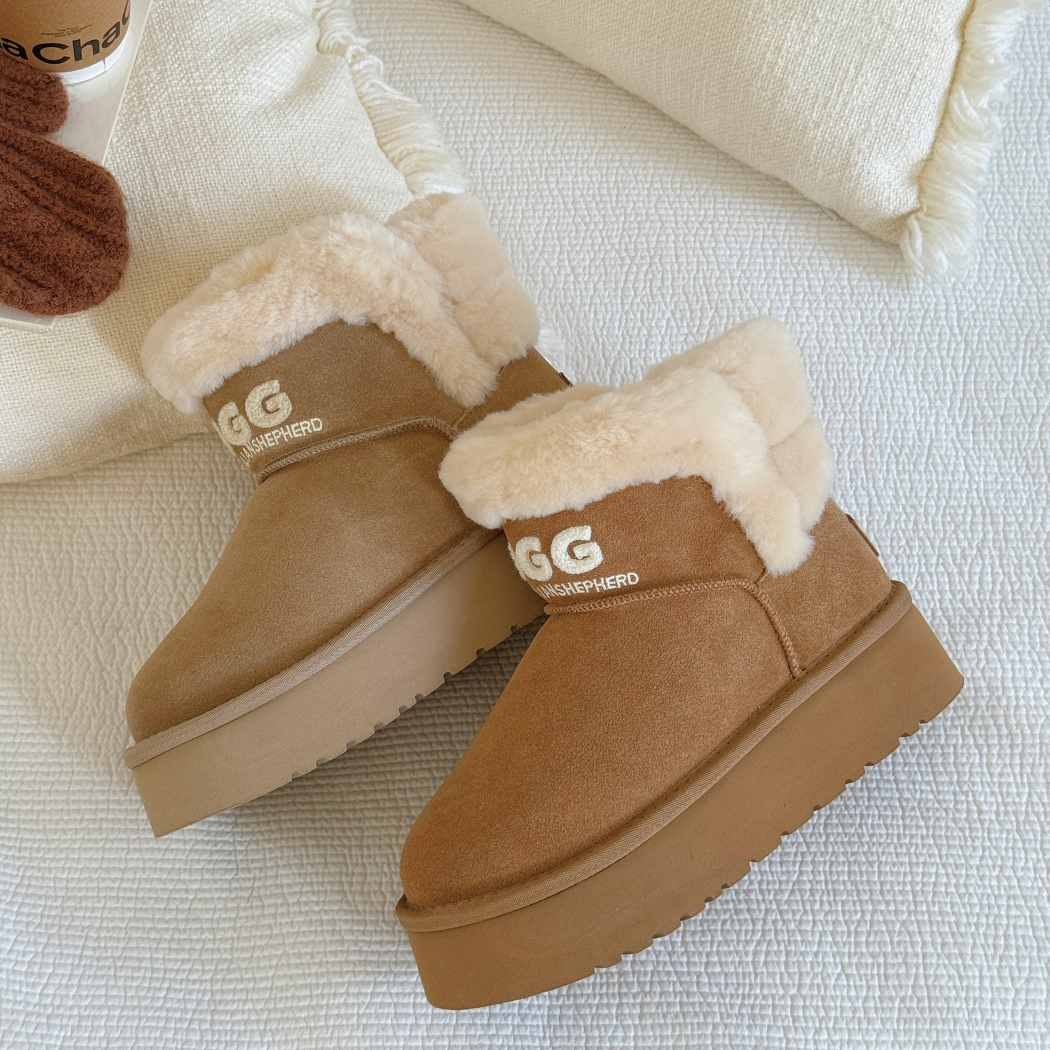 Front angle view of AUSTRALIAN SHEPHERD® UGG Boots Sheepskin Wool Ankle Platform Oatha AS 3150 in Sand featuring premium suede, warm sheepskin wool, and a lightweight platform sole.