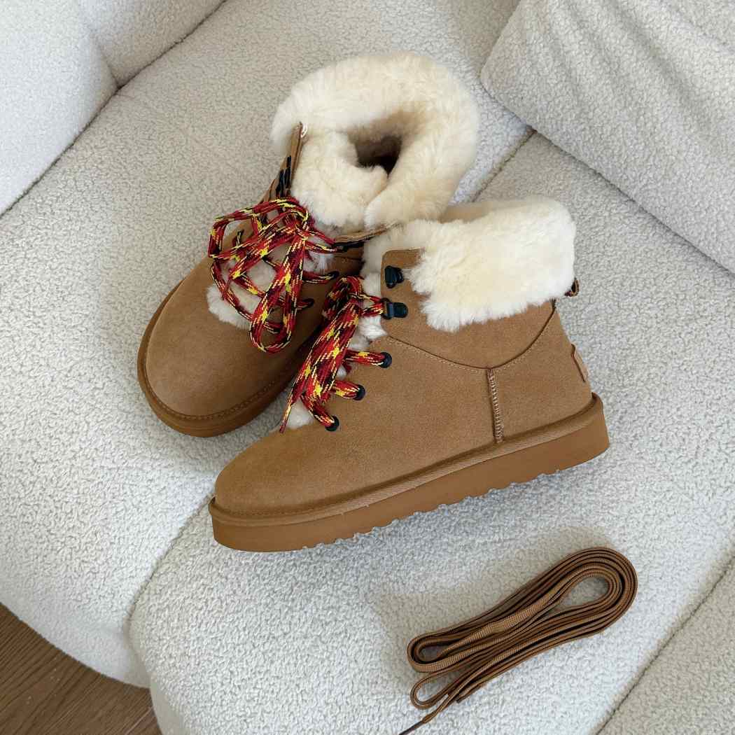 Front angled view of AUSTRALIAN SHEPHERD UGG Boots Sheepskin Wool Collar Lace Up Trego AS 3110 with decorative patterned laces and premium suede construction.