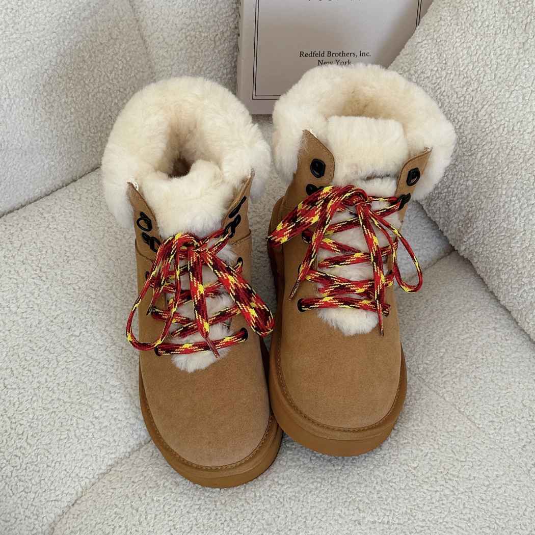 Side angled view of AUSTRALIAN SHEPHERD UGG Boots Sheepskin Wool Collar Lace Up Trego AS 3110 in Chestnut highlighting the wool collar, premium suede, and lace-up design.
