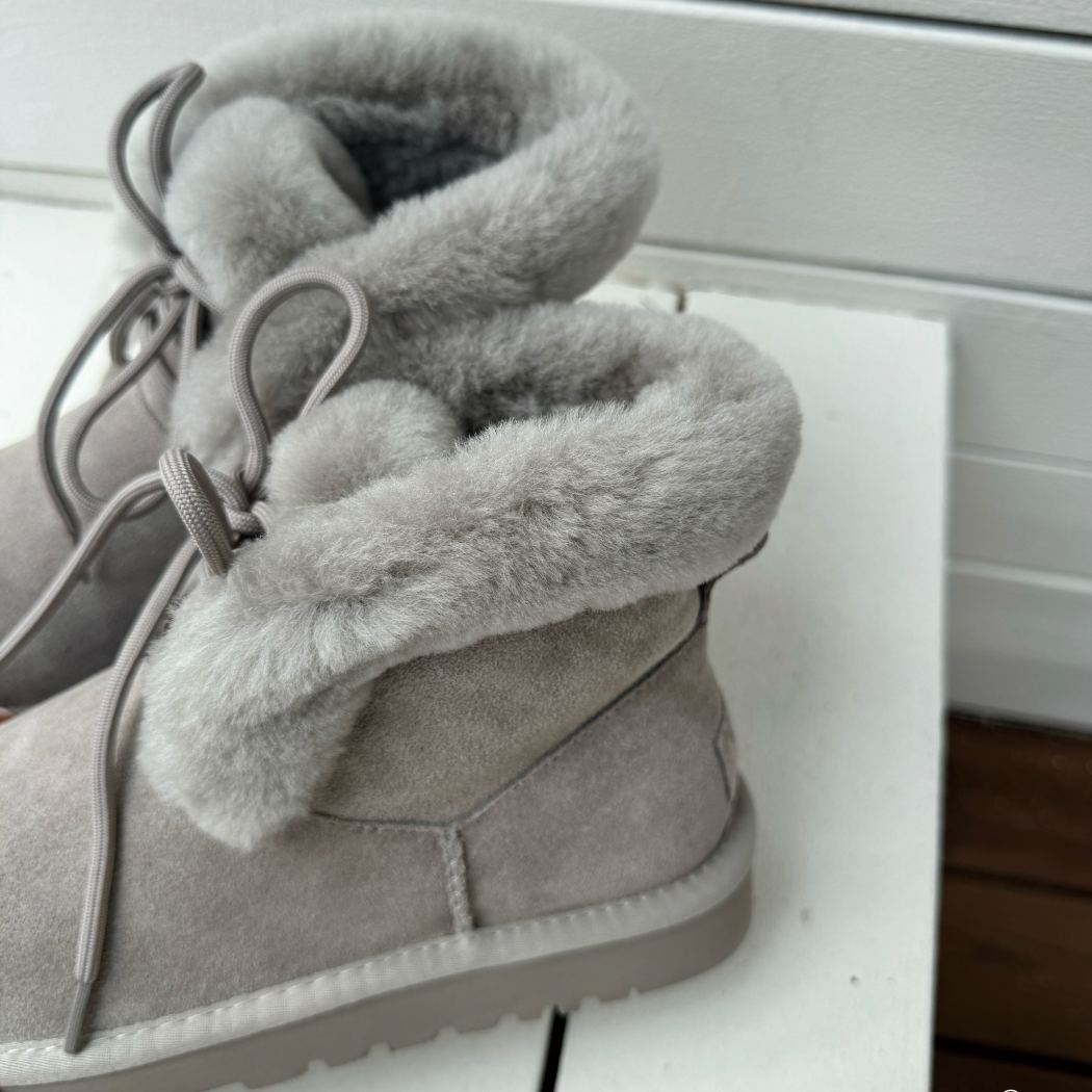 Top view of AUSTRALIAN SHEPHERD® UGG Boots Women Sheepskin Wool Lace Up Dreva AS 3120 in Pebble Grey highlighting the plush wool interior.