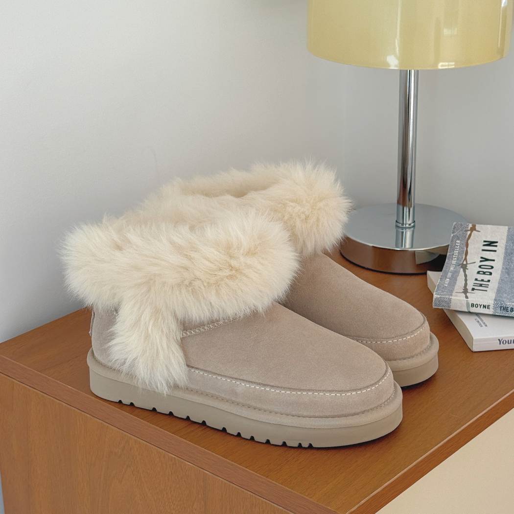 Side view of AUSTRALIAN SHEPHERD® UGG Boots Women Sheepskin Wool Trim Ankle Frovia AS 3131 in Sand featuring premium cow suede, sheepskin wool trim, and a durable EVA outsole.