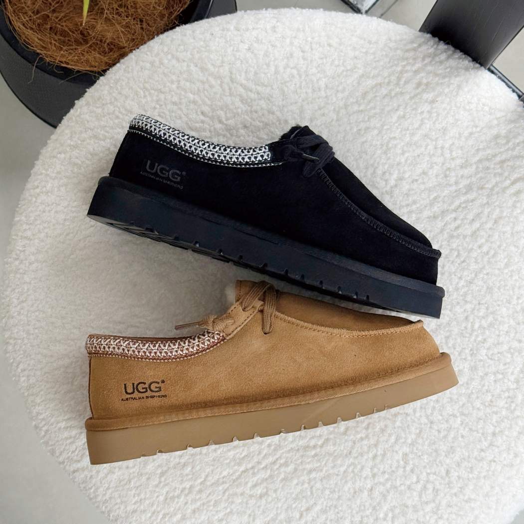 Side view of AUSTRALIAN SHEPHERD UGG Marek Sheepskin Wool Lace-Up Slippers AS 7055 in Black with premium suede and durable lightweight outsole.