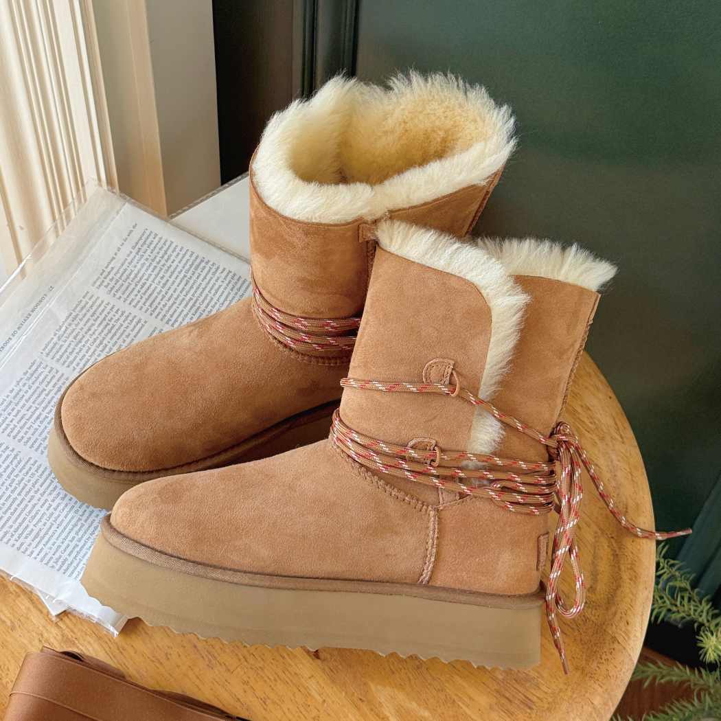 Side view of AUSTRALIAN SHEPHERD® UGG Platform Boots Carmont AS 3124 in Chestnut featuring decorative laces and plush wool lining.