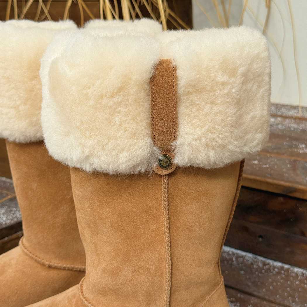 Rear view of AUSTRALIAN SHEPHERD UGG Sheepskin Wool Tall Boots Eleny AS 3152 showcasing the fold-over sheepskin cuff and leather pull tab.