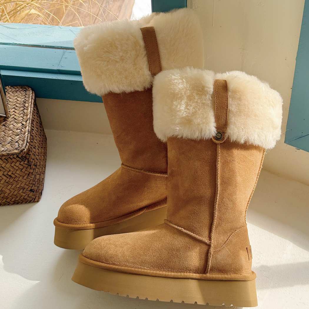 Angled view of AUSTRALIAN SHEPHERD UGG Sheepskin Wool Tall Platform Boots Eleny AS 3153 highlighting the premium suede construction and warm sheepskin wool lining.