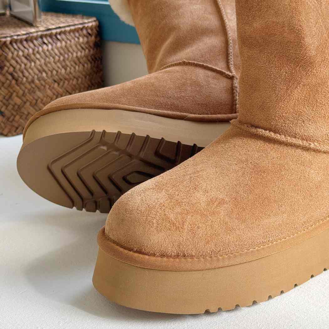 Side profile of AUSTRALIAN SHEPHERD UGG Sheepskin Wool Tall Platform Boots Eleny AS 3153 featuring a lightweight platform sole and premium suede finish.