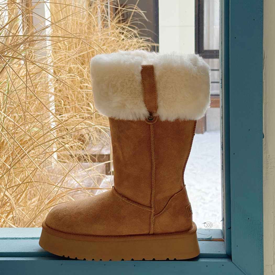 Side view of AUSTRALIAN SHEPHERD UGG Sheepskin Wool Tall Platform Boots Eleny AS 3153 in Chestnut with a fold-over sheepskin wool cuff.