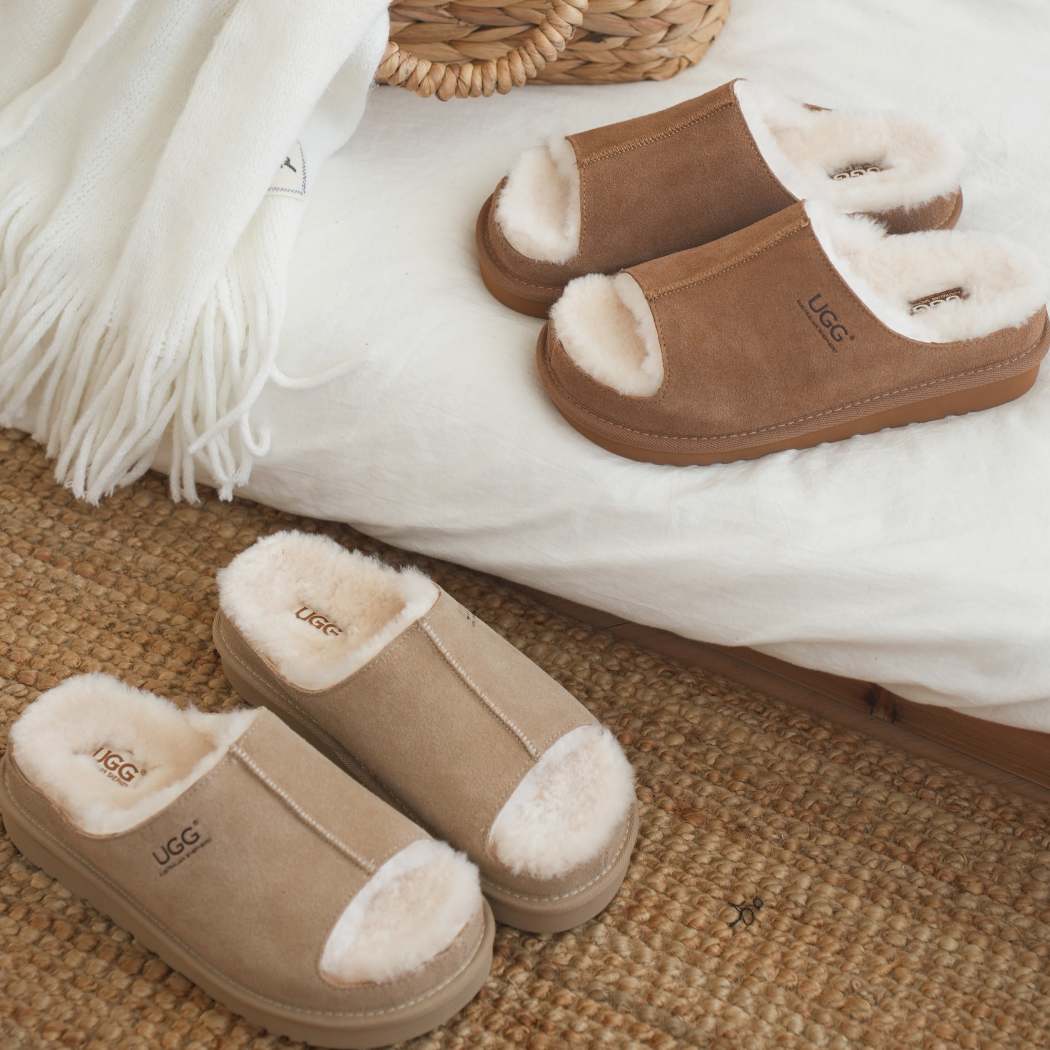 Pair of AUSTRALIAN SHEPHERD® UGG Slippers Sheepskin Wool Colven AS 7033 in Sand showcasing the open-toe design, plush sheepskin wool lining, and lightweight platform sole.