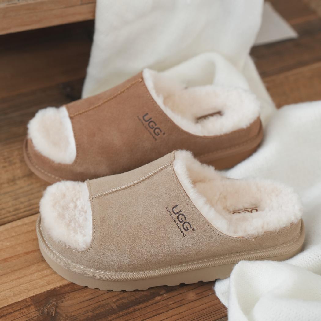 Side view of AUSTRALIAN SHEPHERD® UGG Slippers Sheepskin Wool Colven AS 7033 in Sand featuring premium cow suede and luxurious sheepskin wool lining.