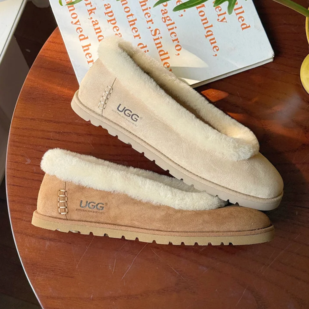 Side view of AUSTRALIAN SHEPHERD® UGG Slippers Women Sheepskin Wool Trim Milea AS 7040 showcasing the premium cow suede upper and soft sheepskin wool trim.