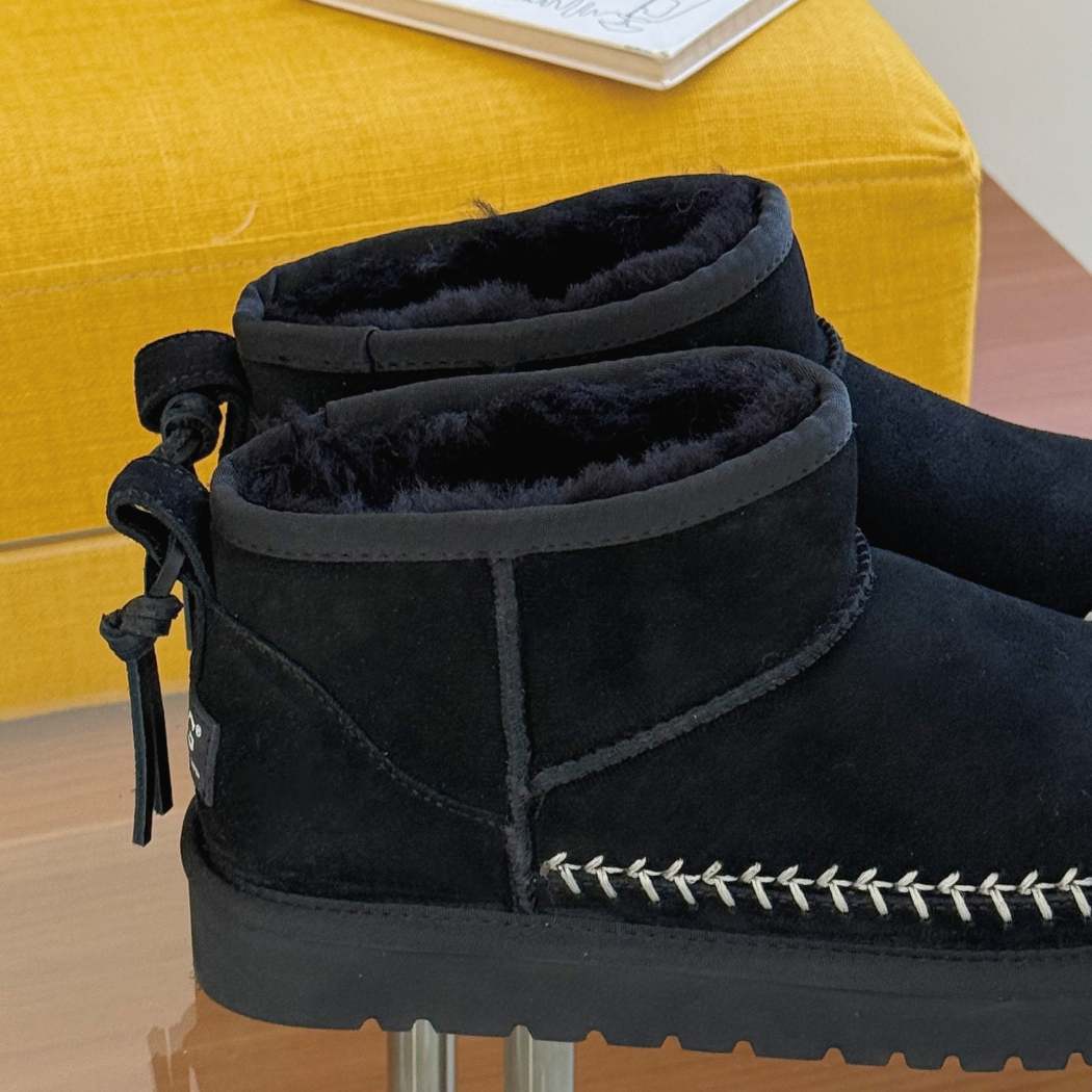 Side profile of Canlia cow suede mini ankle boots AS 3144 in Black