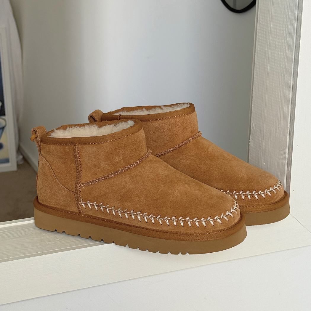 Side profile of Canlia cow suede mini ankle boots AS 3144