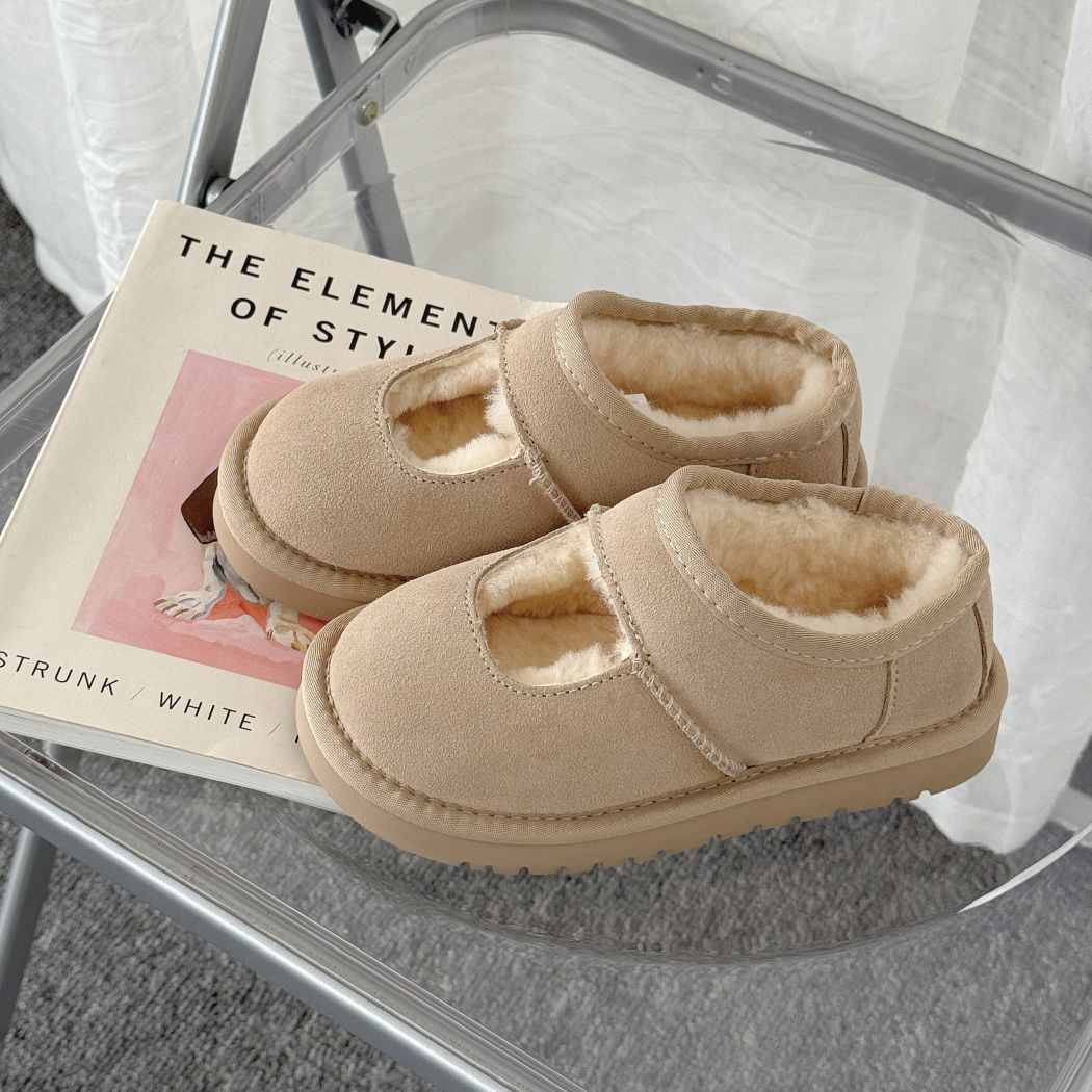 Front three-quarter view of Carmella kids Mary Jane ankle slippers AS 2127K in Sand