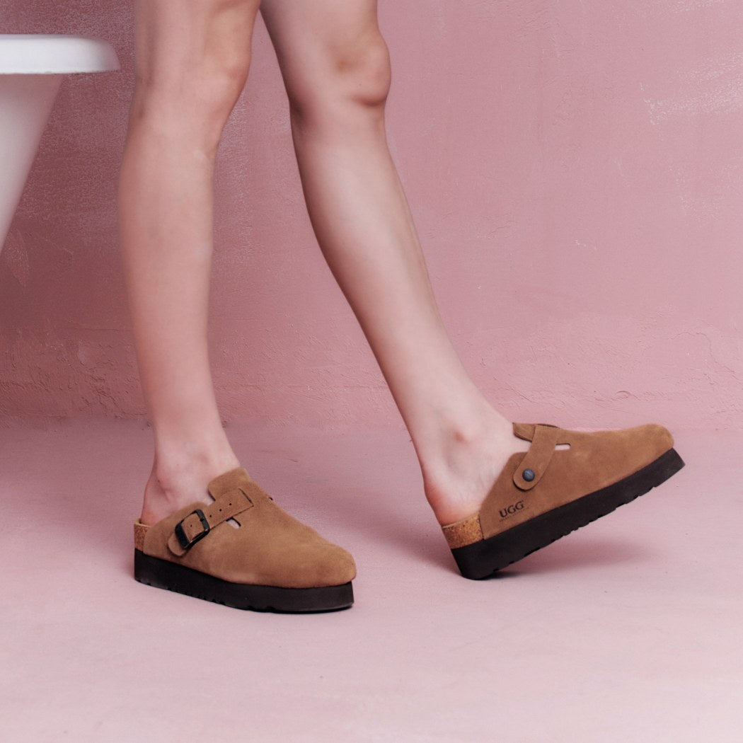 Lifestyle sitting view of Classic Birken platform clogs with tassels OZ 7003