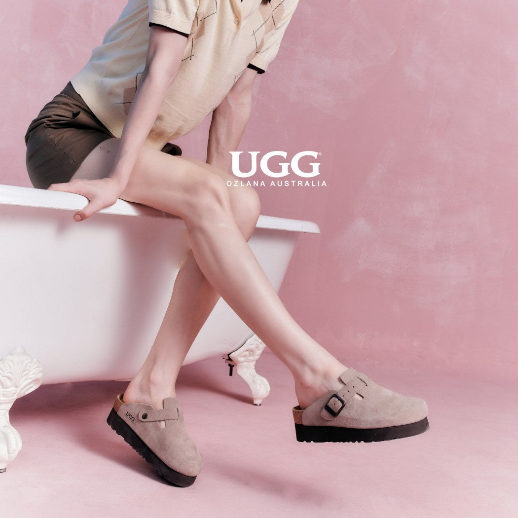 Lifestyle side view of Classic Birken platform clogs with removable tassels OZ 7003 in Taupe