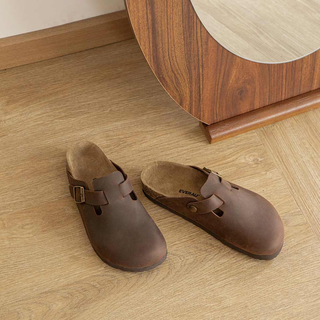 Pair of EVERAU Brooklyn Adjustable Buckled Slides Women Leather Slip-On Flat Sandals EA 7058 in Chestnut with a comfortable cork footbed.