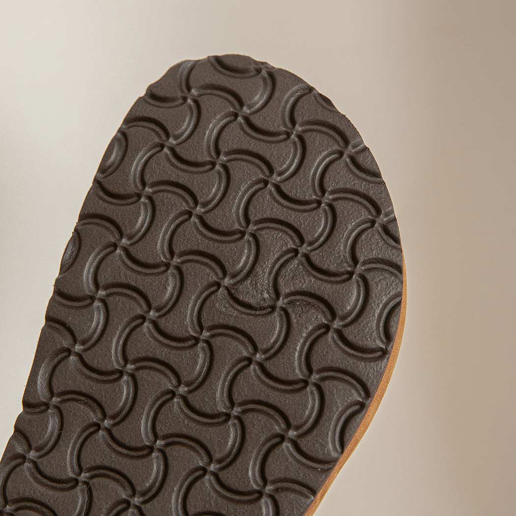 Outsole view of EVERAU Brooklyn Adjustable Buckled Slides Women Leather Slip-On Flat Sandals EA 7058 showing the durable anti-slip tread.