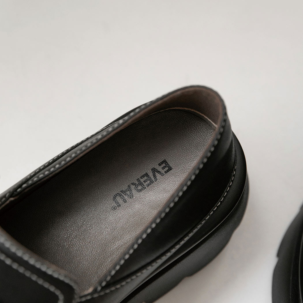 Rear heel view of EVERAU® Women Leather Black Platform Chunky Loafers Evanna EA 7067 with a structured leather heel and chunky sole.