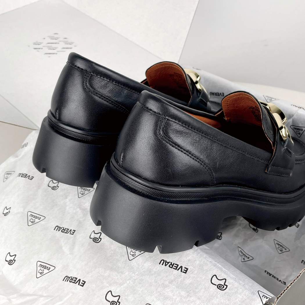 Rear view of EVERAU® Women Leather Gold Buckle Platform Chunky Loafers Della EA 7032 in Black showcasing the platform heel.