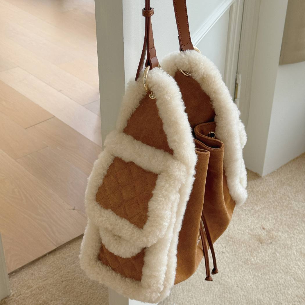 Side gusset view of Maple split cow suede sheepskin wool tote bag ASA 049 in Chestnut