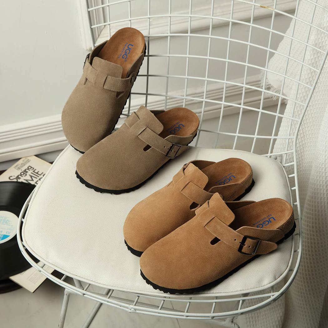 Front three-quarter view of Sandra cow suede soft footbed buckle mule slippers DK 1643 in Chestnut