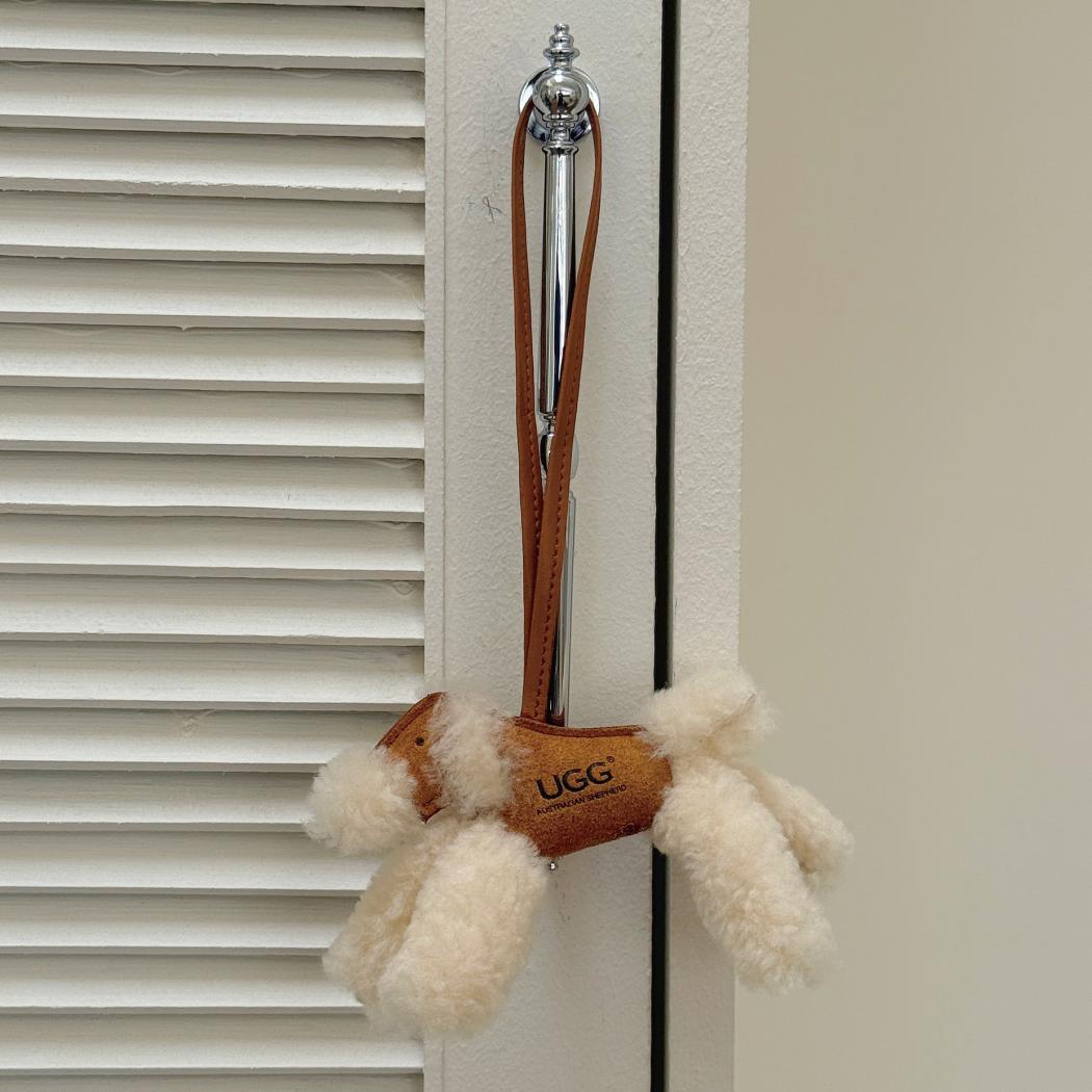 Snowlo fluffy wool dog bag charm keyring ASZ 048 hanging by the leather loop