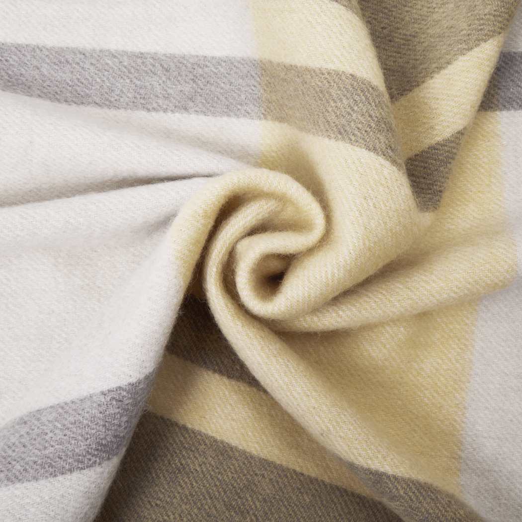 Close-up of the Light Beige 100% wool check fabric on the Urban UGG Wynel scarf UR8011