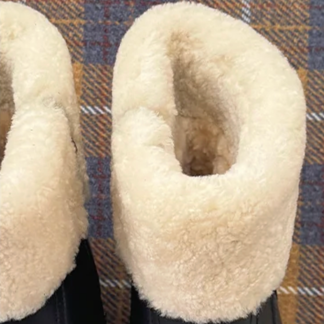 Side zipper detail of women's sheepskin wool leather ankle boots AS 4010
